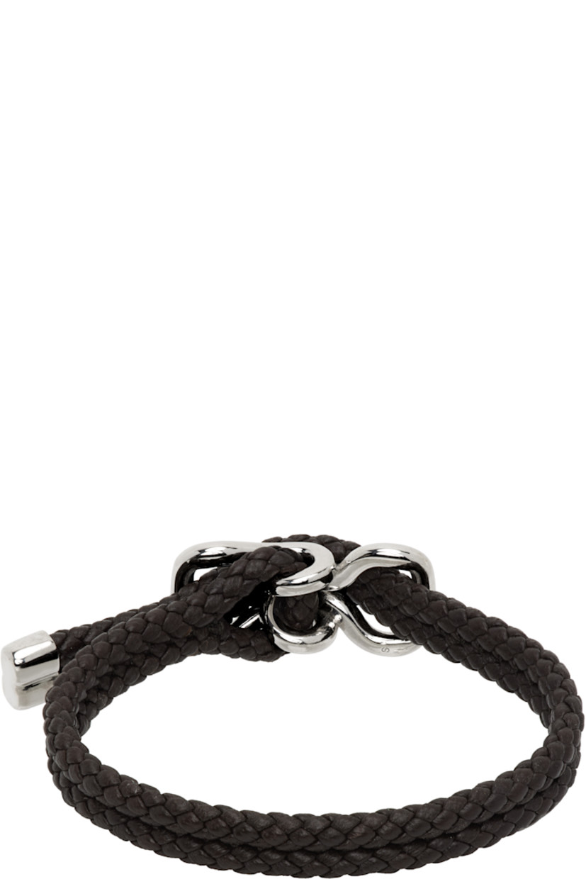 Tiered braided nappa leather bracelet in brown. 

· Cinch fastening 
· Logo-engraved sterling silver hardware 
· L9"

Supplier color: Fondant
