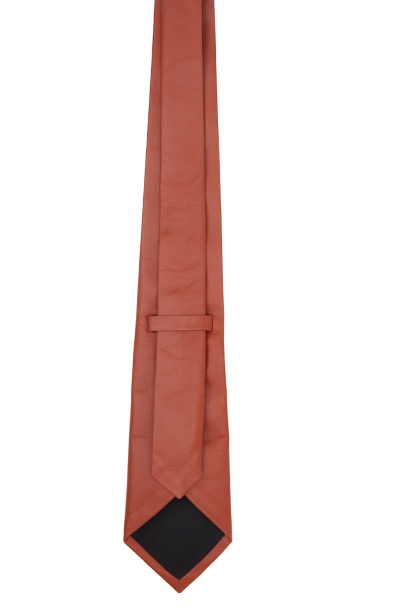 Buffed lambskin tie in brown. 

· Keeper loop at back face
· W3.25"

Supplier color: Copper