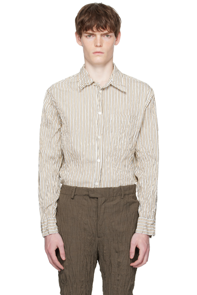 Crinkled cotton-blend poplin shirt.

· Striped throughout
· Spread collar
· Button closure
· Patch pocket at chest
· Shirttail hem
· Buttoned barrel cuffs

Supplier color: Beige/White/Black
