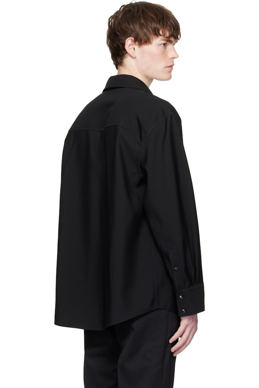 Wool barathea shirt.

· Open spread collar
· Removable enameled hardware at collar
· Concealed button closure
· Patch pocket at chest
· Twin creases at front
· Shirttail hem
· Panel at shoulders
· Buttoned barrel cuffs

Supplier color: Black