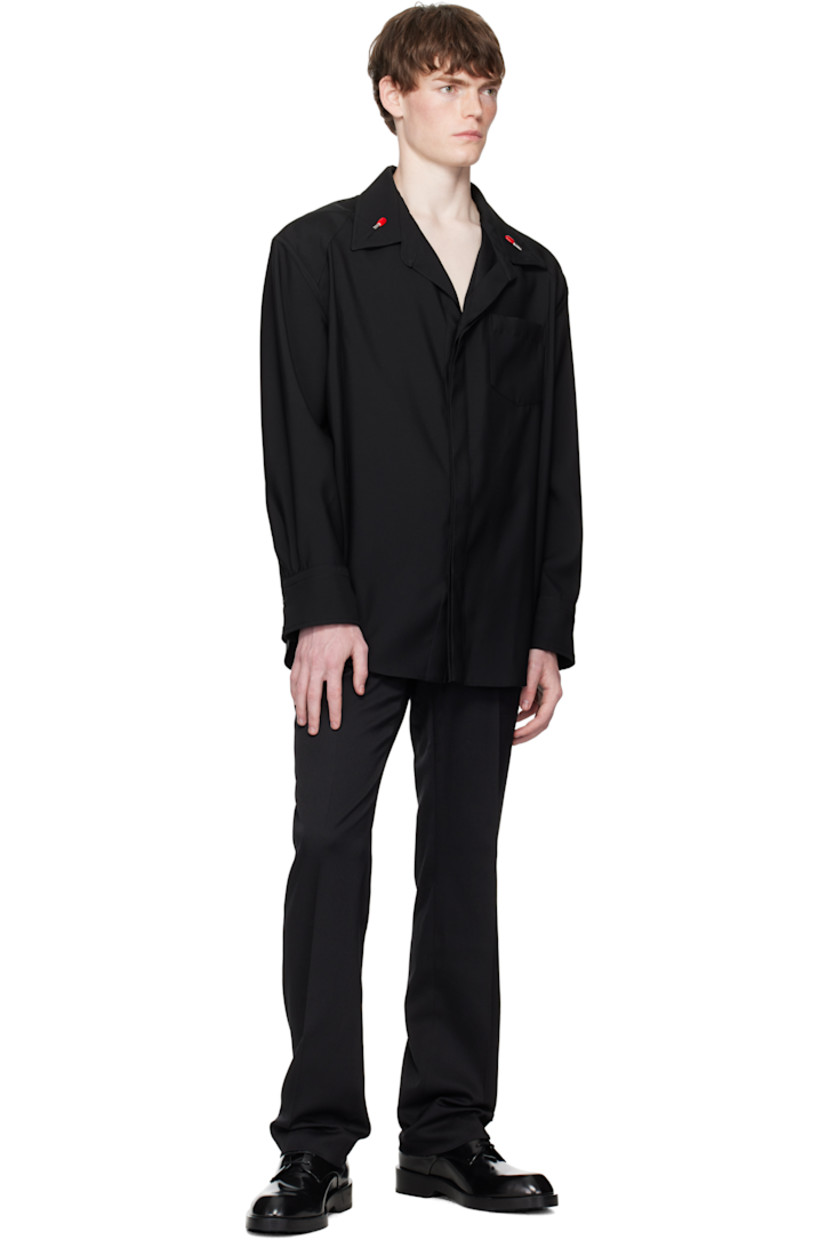 Wool barathea shirt.

· Open spread collar
· Removable enameled hardware at collar
· Concealed button closure
· Patch pocket at chest
· Twin creases at front
· Shirttail hem
· Panel at shoulders
· Buttoned barrel cuffs

Supplier color: Black