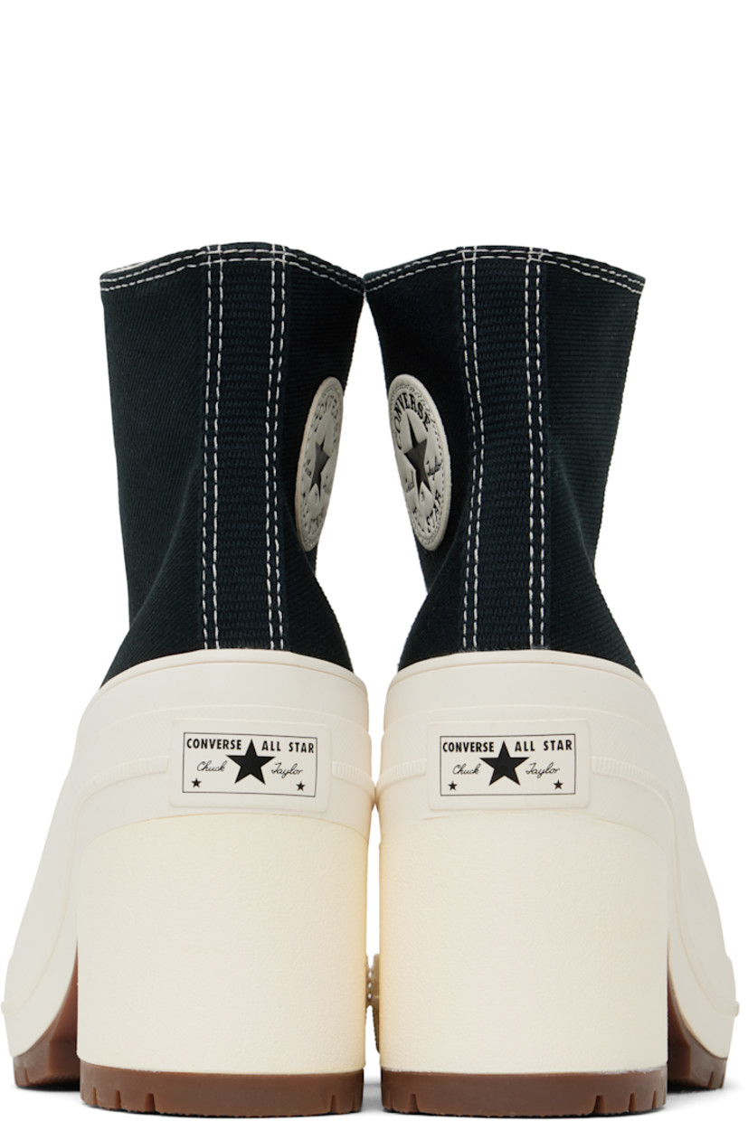 Cotton twill heeled sneakers in black.

· Rubber cap toe
· Lace-up closure
· Logo patch and eyelets at inner side
· Rubberized logo patch at heel
· Canvas lining
· Cushioned OrthoLite® footbed
· Foam rubber block heel
· Treaded rubber sole
· Contrast stitching in white
· Heel: H3.5"

Supplier color: Black/Egret/Egret