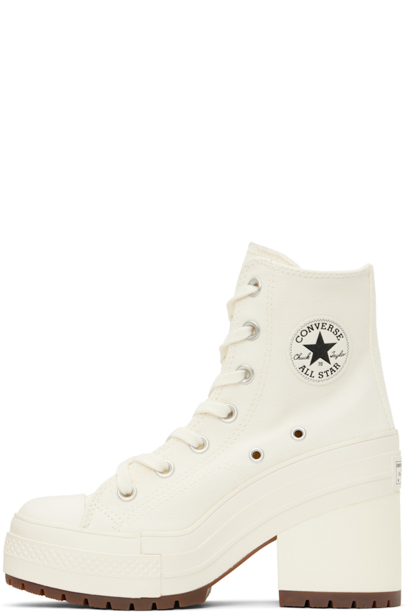 Cotton twill heeled sneakers in white.

· Rubber cap toe
· Lace-up closure
· Logo patch and eyelets at inner side
· Rubberized logo patch at heel
· Canvas lining
· Cushioned OrthoLite® footbed
· Foam rubber block heel
· Treaded rubber sole
· Heel: H3.5"

Supplier color: Egret/Egret/Black