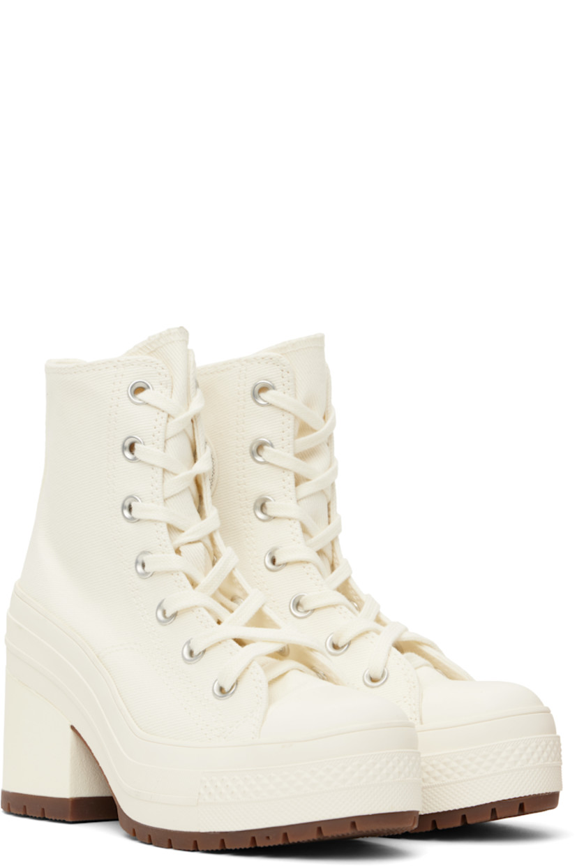Cotton twill heeled sneakers in white.

· Rubber cap toe
· Lace-up closure
· Logo patch and eyelets at inner side
· Rubberized logo patch at heel
· Canvas lining
· Cushioned OrthoLite® footbed
· Foam rubber block heel
· Treaded rubber sole
· Heel: H3.5"

Supplier color: Egret/Egret/Black