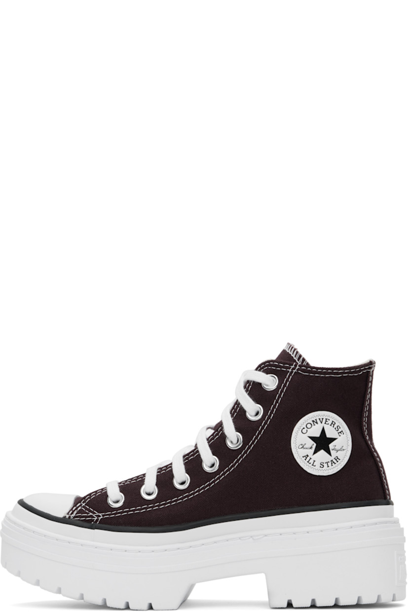 High-top canvas sneakers in burgundy.

· Rubber cap toe
· Lace-up closure
· Logo patch at inner side
· Cushioned OrthoLite® footbed
· Mesh lining
· Logo embossed at heel
· Lugged rubber platform sole
· Contrast stitching in white
· Platform: H2"

Supplier color: Bloodstone/White/Black