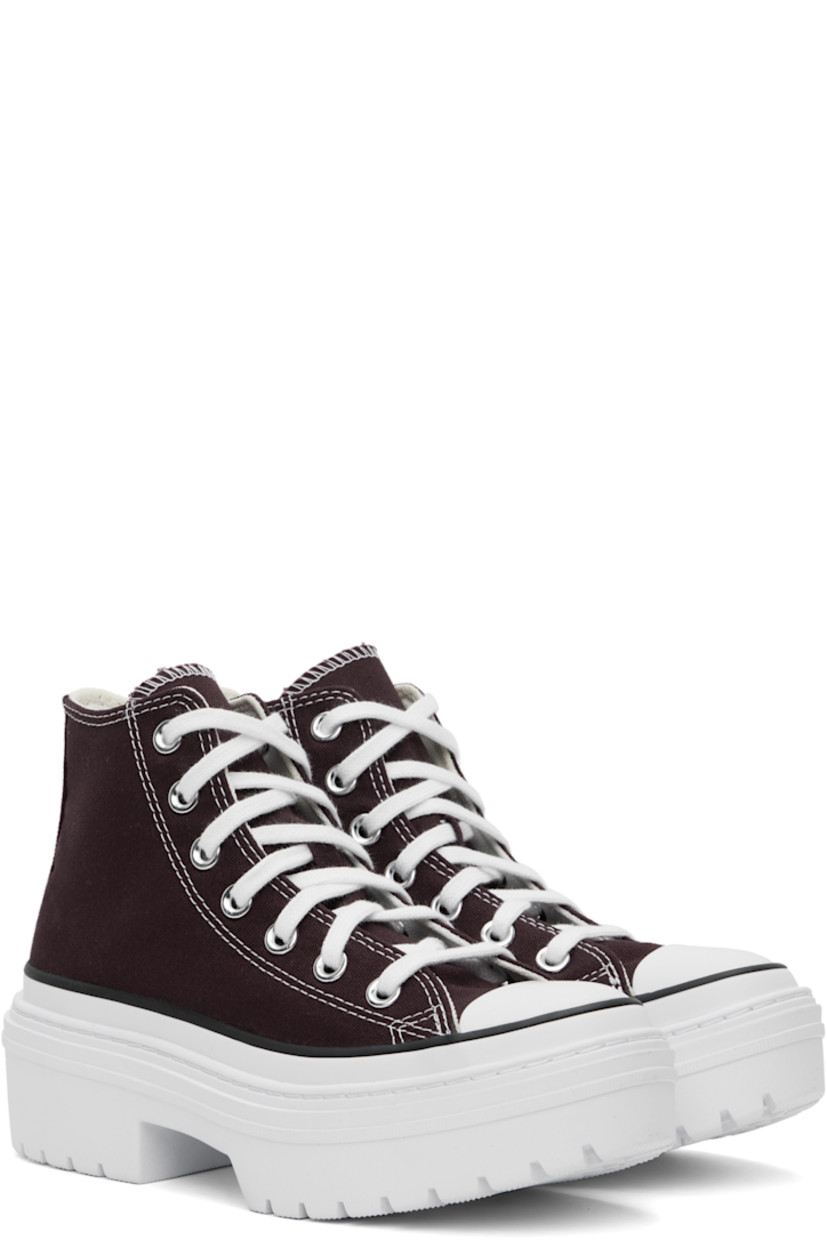 High-top canvas sneakers in burgundy.

· Rubber cap toe
· Lace-up closure
· Logo patch at inner side
· Cushioned OrthoLite® footbed
· Mesh lining
· Logo embossed at heel
· Lugged rubber platform sole
· Contrast stitching in white
· Platform: H2"

Supplier color: Bloodstone/White/Black