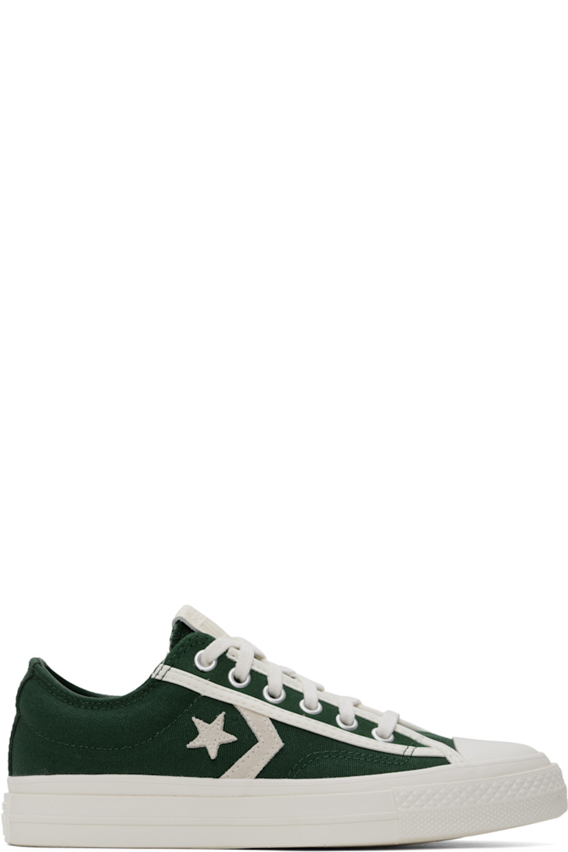 Low-top canvas sneakers in green.

· Rubber cap toe
· Lace-up closure
· Logo patch at tongue
· Padded collar
· Logo appliqué at sides
· Cushioned OrthoLite® footbed
· Buffed leather and mesh lining
· Treaded rubber sole

Supplier color: Green envy/Egret/Vintage white