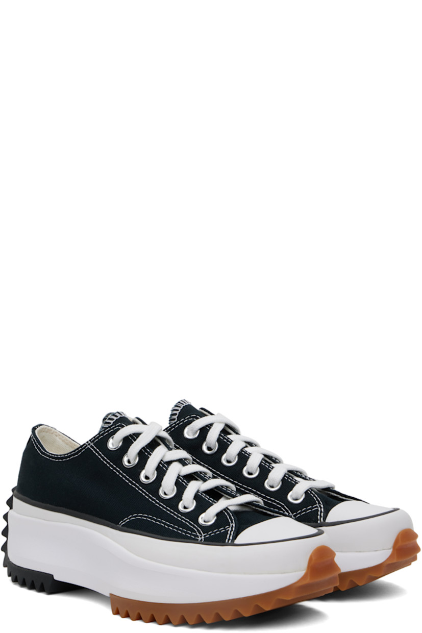 Low-top canvas sneakers in black.

· Rubber cap toe
· Lace-up closure
· Eyelets at inner side
· Cushioned OrthoLite® footbed
· Mesh lining
· Rubberized logo appliqué at heel
· Platform rubber midsole
�· Treaded rubber sole
· Contrast stitching in white
· Platform: H1.5"

Supplier color: Black/White/Gum