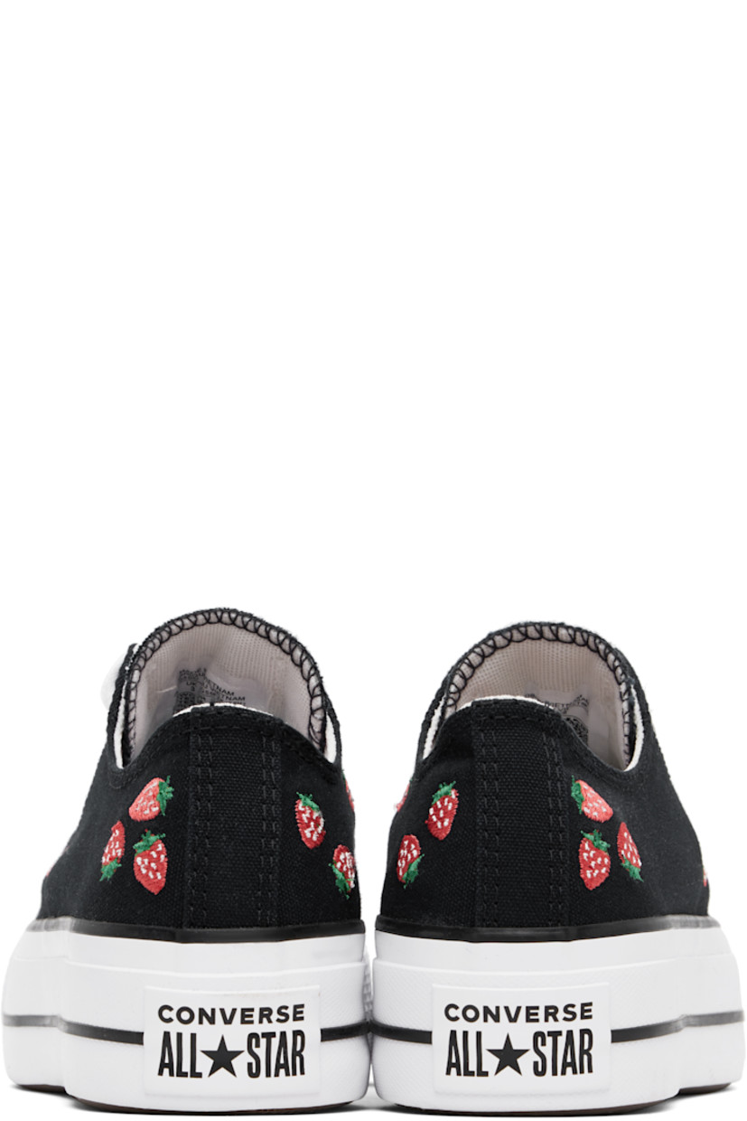 Low-top canvas sneakers in black.

· Rubber cap toe
· Lace-up closure
· Logo patch at tongue
· Graphics embroidered at sides
· Eyelets at inner side
· Rubberized logo patch at heel
· Cushioned OrthoLite® footbed
· Treaded rubber platform sole
· Platform: H1.5"

Supplier color: Black/Soft red/White