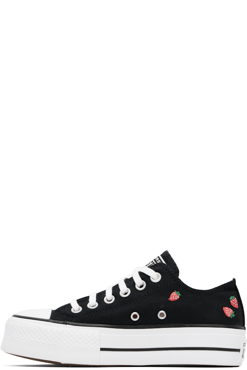 Low-top canvas sneakers in black.

· Rubber cap toe
· Lace-up closure
· Logo patch at tongue
· Graphics embroidered at sides
· Eyelets at inner side
· Rubberized logo patch at heel
· Cushioned OrthoLite® footbed
· Treaded rubber platform sole
· Platform: H1.5"

Supplier color: Black/Soft red/White