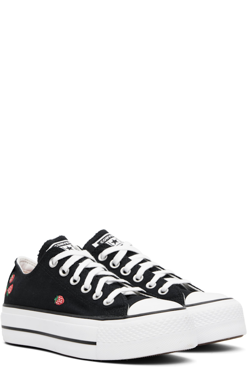 Low-top canvas sneakers in black.

· Rubber cap toe
· Lace-up closure
· Logo patch at tongue
· Graphics embroidered at sides
· Eyelets at inner side
· Rubberized logo patch at heel
· Cushioned OrthoLite® footbed
· Treaded rubber platform sole
· Platform: H1.5"

Supplier color: Black/Soft red/White