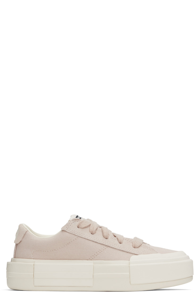 Low-top lightweight canvas and suede sneakers in taupe.

· Lace-up closure
· Logo printed at tongue and heel
· Padded collar
· Cushioned insole
· Treaded rubber platform sole
· Platform: H2"

Supplier color: Warm clay/Egret/Black