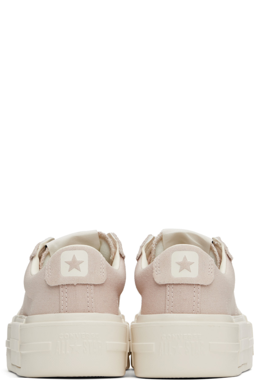 Low-top lightweight canvas and suede sneakers in taupe.

· Lace-up closure
· Logo printed at tongue and heel
· Padded collar
· Cushioned insole
· Treaded rubber platform sole
· Platform: H2"

Supplier color: Warm clay/Egret/Black