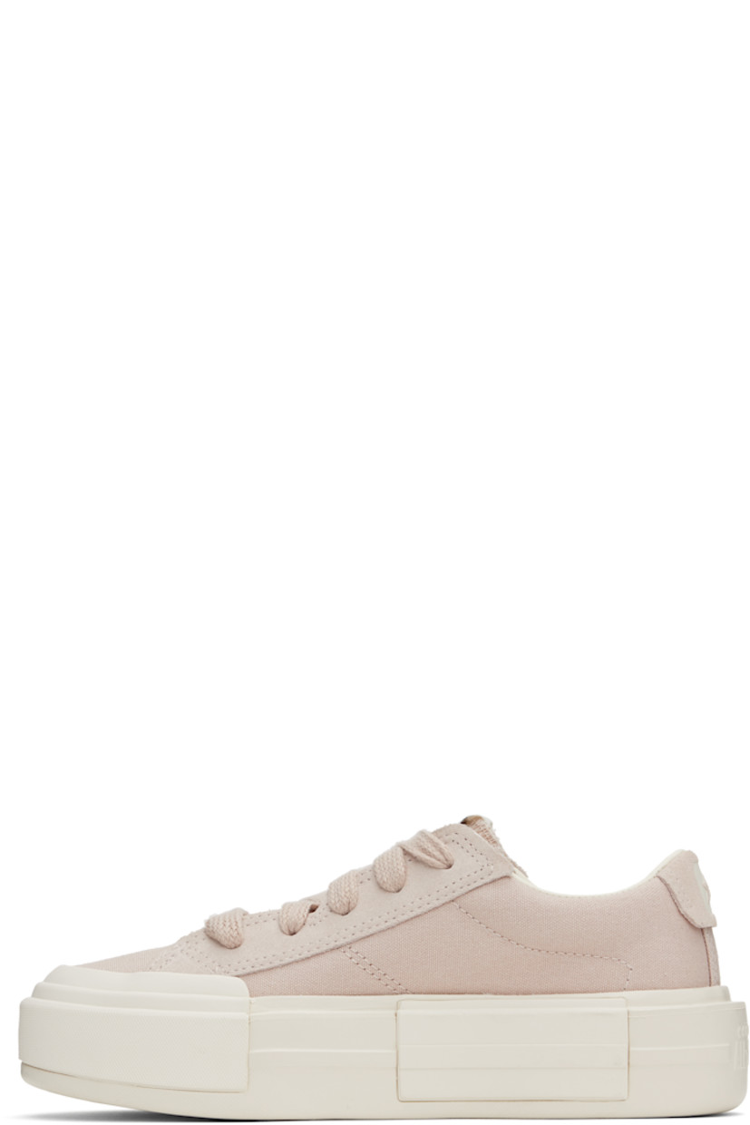 Low-top lightweight canvas and suede sneakers in taupe.

· Lace-up closure
· Logo printed at tongue and heel
· Padded collar
· Cushioned insole
· Treaded rubber platform sole
· Platform: H2"

Supplier color: Warm clay/Egret/Black