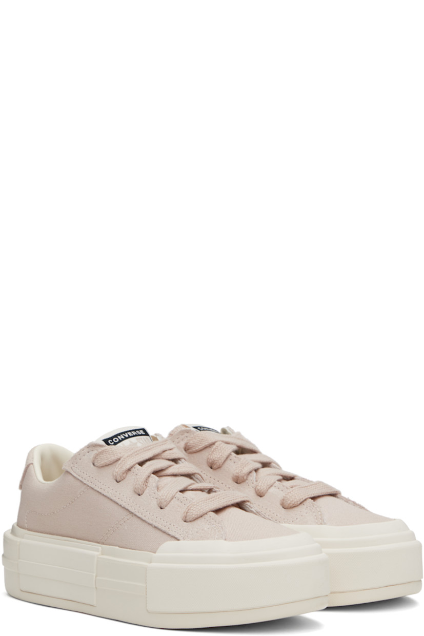 Low-top lightweight canvas and suede sneakers in taupe.

· Lace-up closure
· Logo printed at tongue and heel
· Padded collar
· Cushioned insole
· Treaded rubber platform sole
· Platform: H2"

Supplier color: Warm clay/Egret/Black
