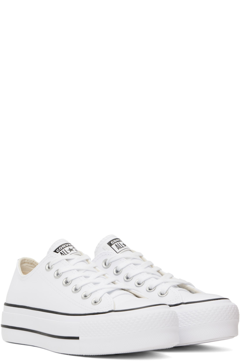 Low-top buffed leather sneakers in white.

· Rubber cap toe
· Lace-up closure
· Logo patch at tongue
· Eyelets at inner side
· Mesh lining
· Rubberized logo patch at heel
· Treaded rubber platform sole
· Platform: H1.5"

Supplier color: White/Black
