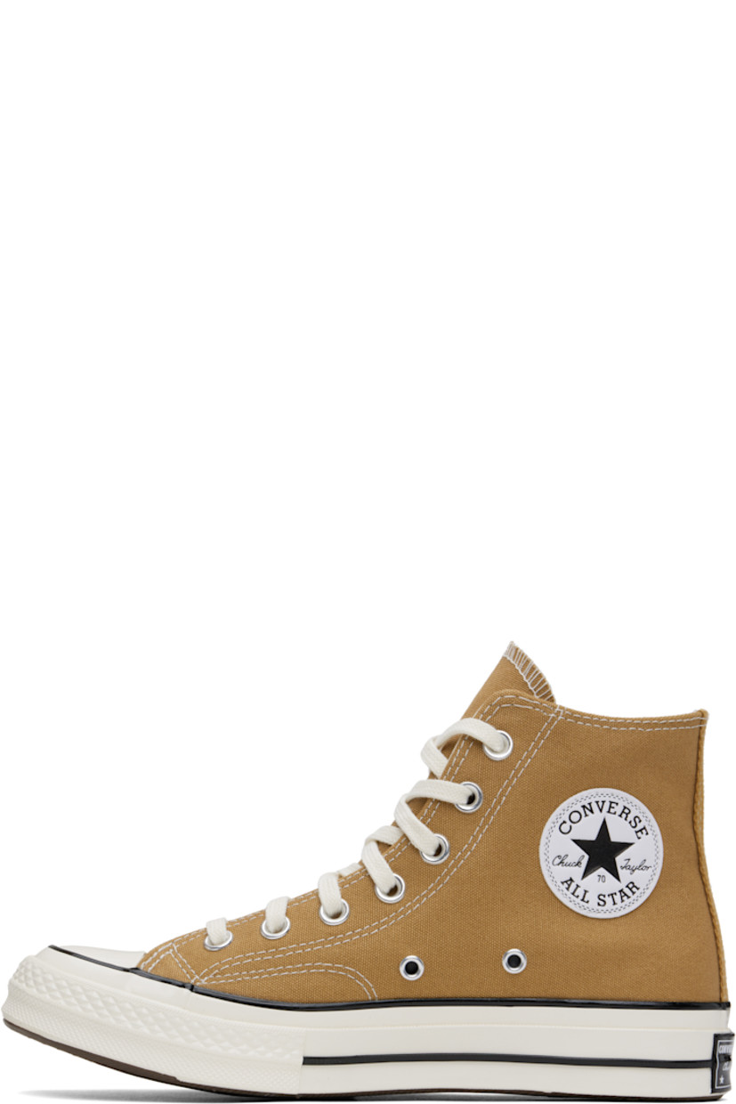 High-top canvas sneakers in tan.

· Rubber cap toe
· Lace-up closure
· Logo patch and eyelets at inner side
· Cushioned OrthoLite® footbed
· Canvas lining
· Rubber logo patch at midsole
· Treaded rubber sole
· Contrast stitching in off-white

Supplier color: Toadstool tan/Egret/Black
