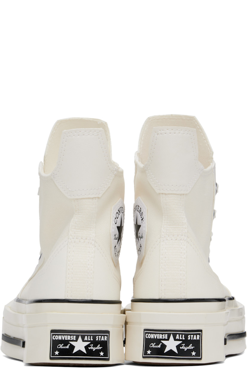 High-top canvas and faux-leather sneakers in off-white.

· Square rubber cap toe
· Lace-up closure
· Pull-tab at heel collar
· Logo patch and eyelets at inner side
· Cushioned Ortholite® footbed
· Rubber logo patch at sculptural midsole
· Treaded rubber sole

Supplier color: Egret/Black/Egret