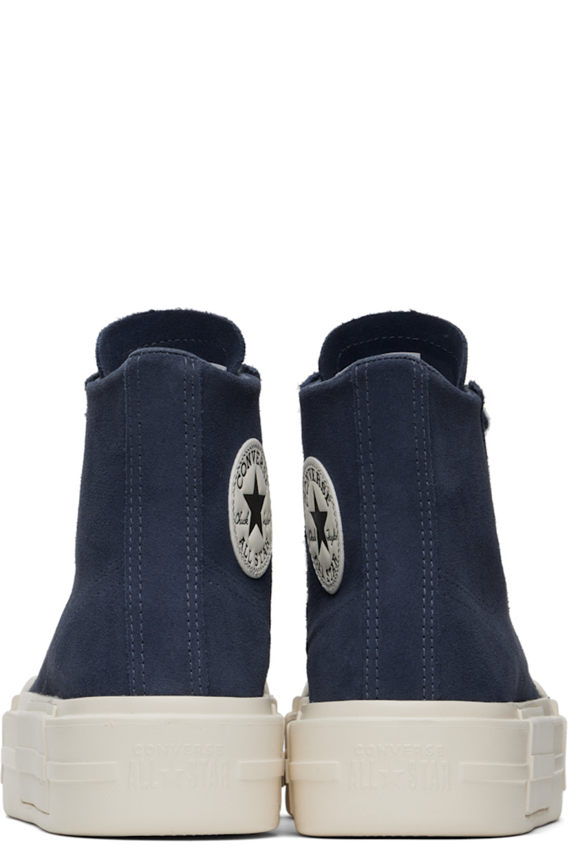 High-top suede sneakers in blue.

· Lace-up closure
· Logo embossed at tongue
· Logo patch at inner side
· Cushioned Ortholite® footbed
· Mesh lining
· Logo embossed at platform midsole
· Treaded rubber sole
· Platform: H2"

Supplier color: Dark waters/Egret/Black