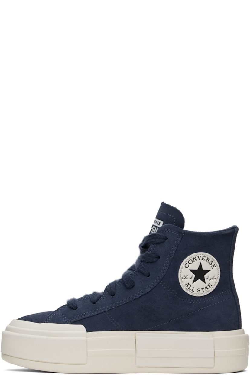 High-top suede sneakers in blue.

· Lace-up closure
· Logo embossed at tongue
· Logo patch at inner side
· Cushioned Ortholite® footbed
· Mesh lining
· Logo embossed at platform midsole
· Treaded rubber sole
· Platform: H2"

Supplier color: Dark waters/Egret/Black