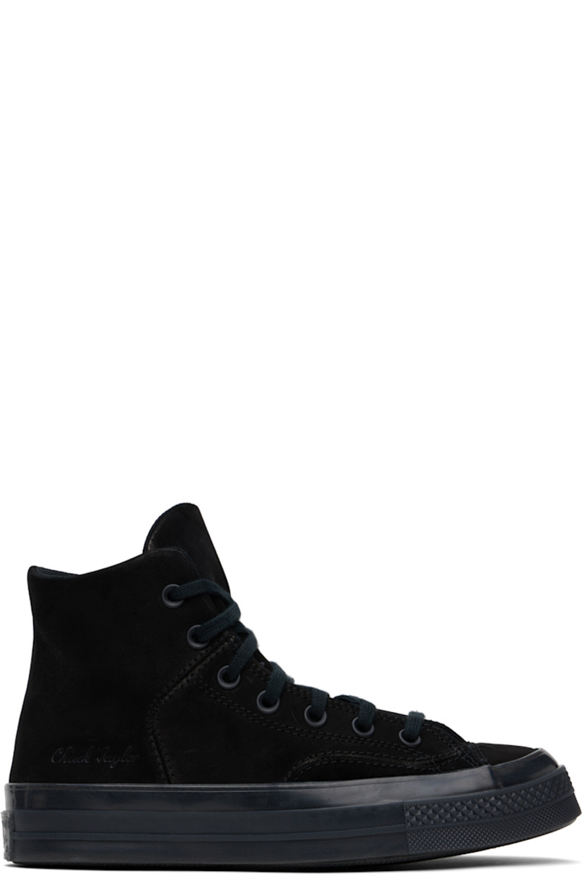 High-top nubuck and suede sneakers in black.

· Lace-up closure
· Text embossed at outer side
· Suede logo patch at inner side
· Mesh lining 
· Cushioned CX Foam insole 
· Textured platform rubber midsole
· Treaded rubber sole
· Platform: H1.5"

Supplier color: Black/Black/Black