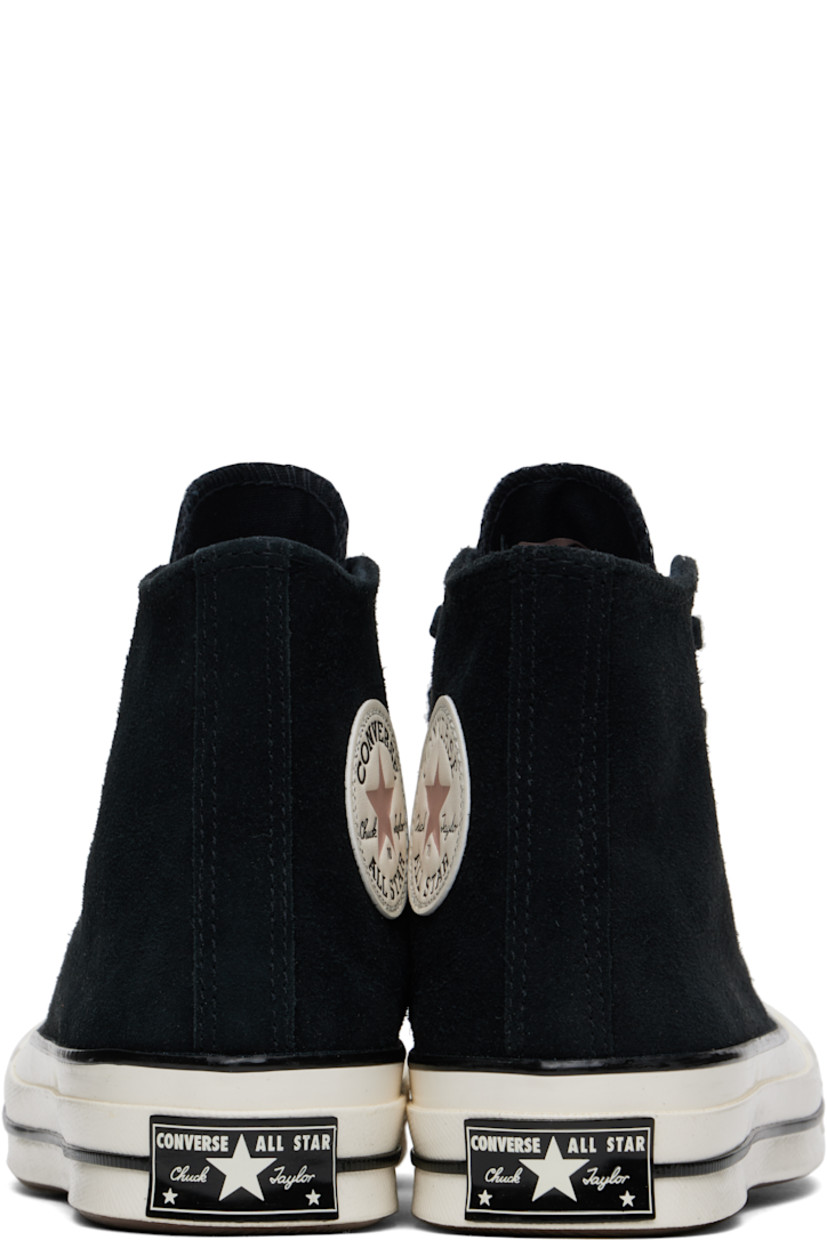 High-top suede sneakers in black.

· Rubber cap toe
· Lace-up closure
· Logo patch and eyelets at inner side
· Canvas lining
· Rubber logo patch at heel
· Stripe at textured rubber midsole
· Treaded rubber sole

Supplier color: Black/Bite the dust/Egret