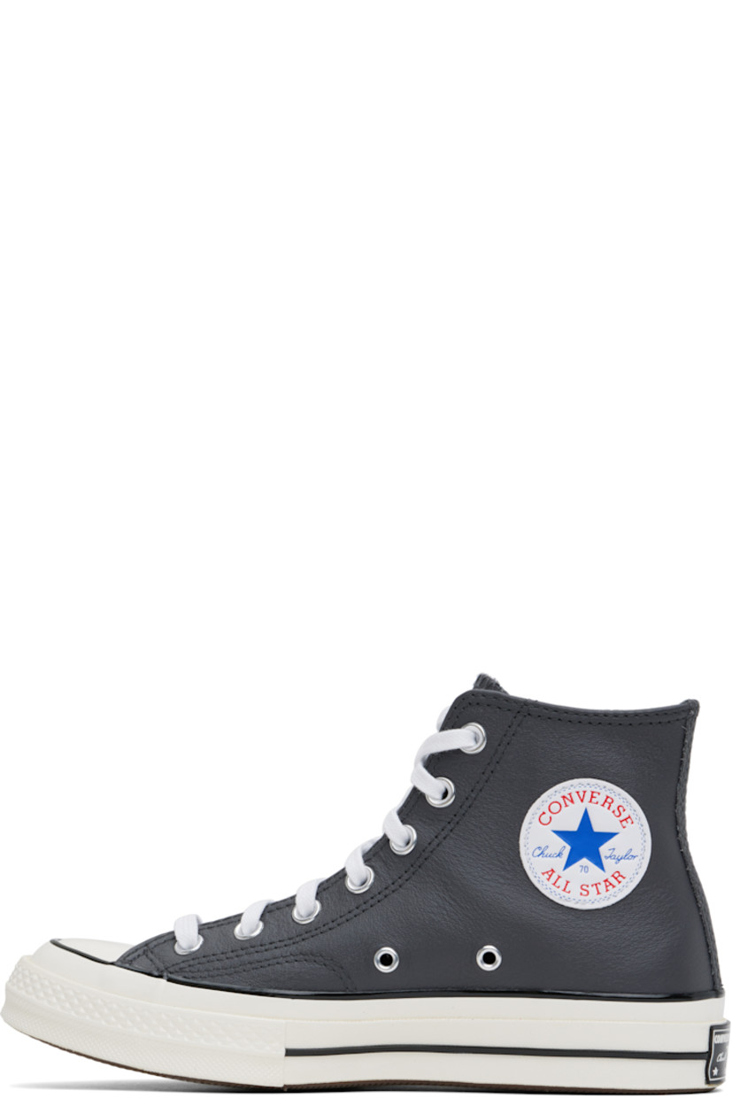 High-top grained leather sneakers in gray.

· Rubber cap toe
· Lace-up closure
· Logo patch and eyelets at inner side
· Rubberized logo patch at heel
· Cushioned OrthoLite® footbed
· Canvas lining
· Treaded rubber sole

Supplier color: Dark matter/Shadow purple/White