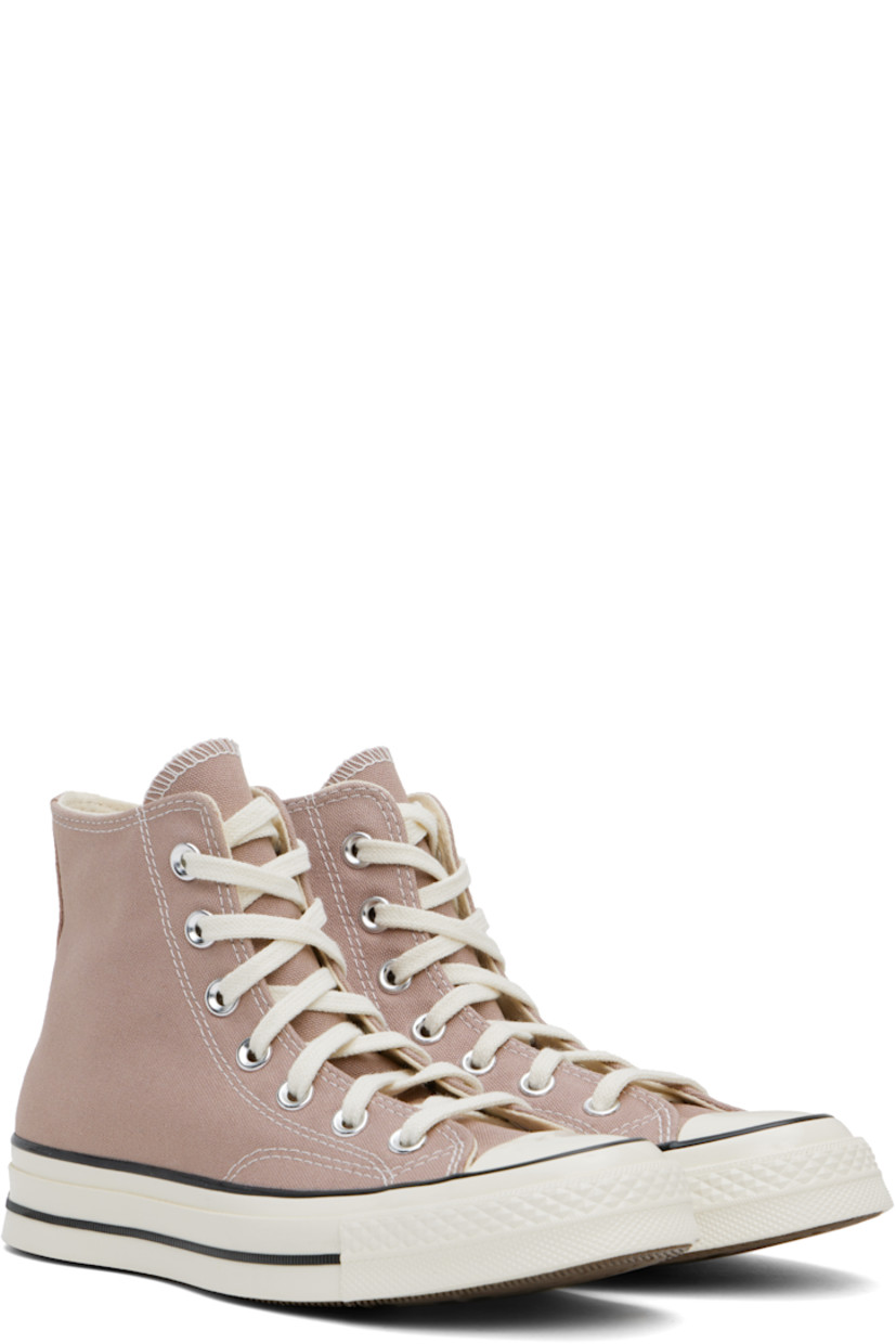 High-top canvas sneakers in taupe.

· Rubber cap toe
· Lace-up closure
· Logo patch and eyelets at inner side
· Rubberized logo patch at heel
· Cushioned OrthoLite® footbed
· Treaded rubber sole
· Contrast stitching in off-white

Supplier color: Bite the dust/Egret/ Black