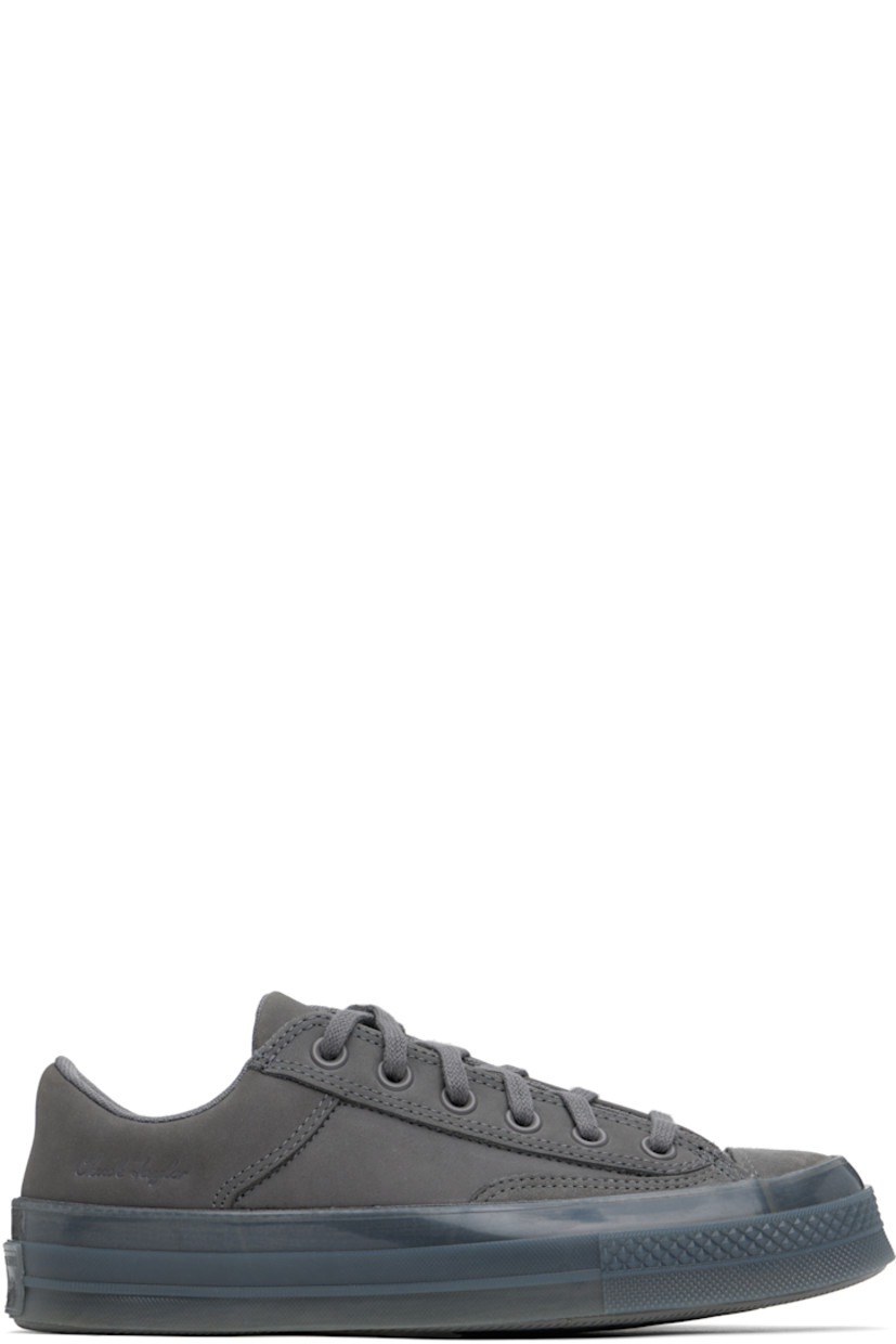 Low-top paneled suede and nubuck sneakers in gray.

· Lace-up closure
· Logo patch at padded tongue
· Padded collar
· Logo embossed at outer side
· Rubberized logo patch at heel
· Padded CX foam footbed
· Mesh lining
· Semi-transparent rubber midsole
· Treaded rubber sole

Supplier color: Sharkskin/Sharkskin/Sharkskin