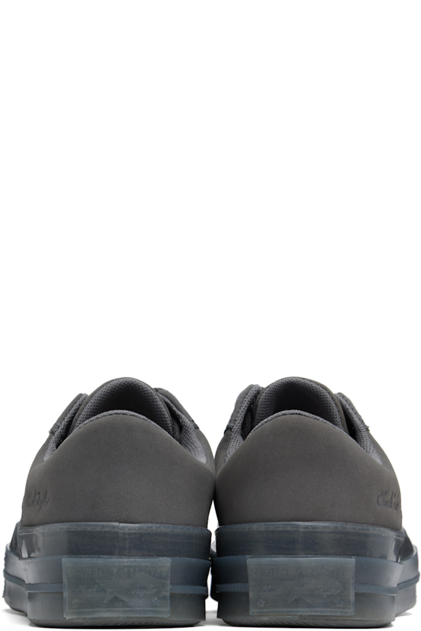Low-top paneled suede and nubuck sneakers in gray.

· Lace-up closure
· Logo patch at padded tongue
· Padded collar
· Logo embossed at outer side
· Rubberized logo patch at heel
· Padded CX foam footbed
· Mesh lining
· Semi-transparent rubber midsole
· Treaded rubber sole

Supplier color: Sharkskin/Sharkskin/Sharkskin