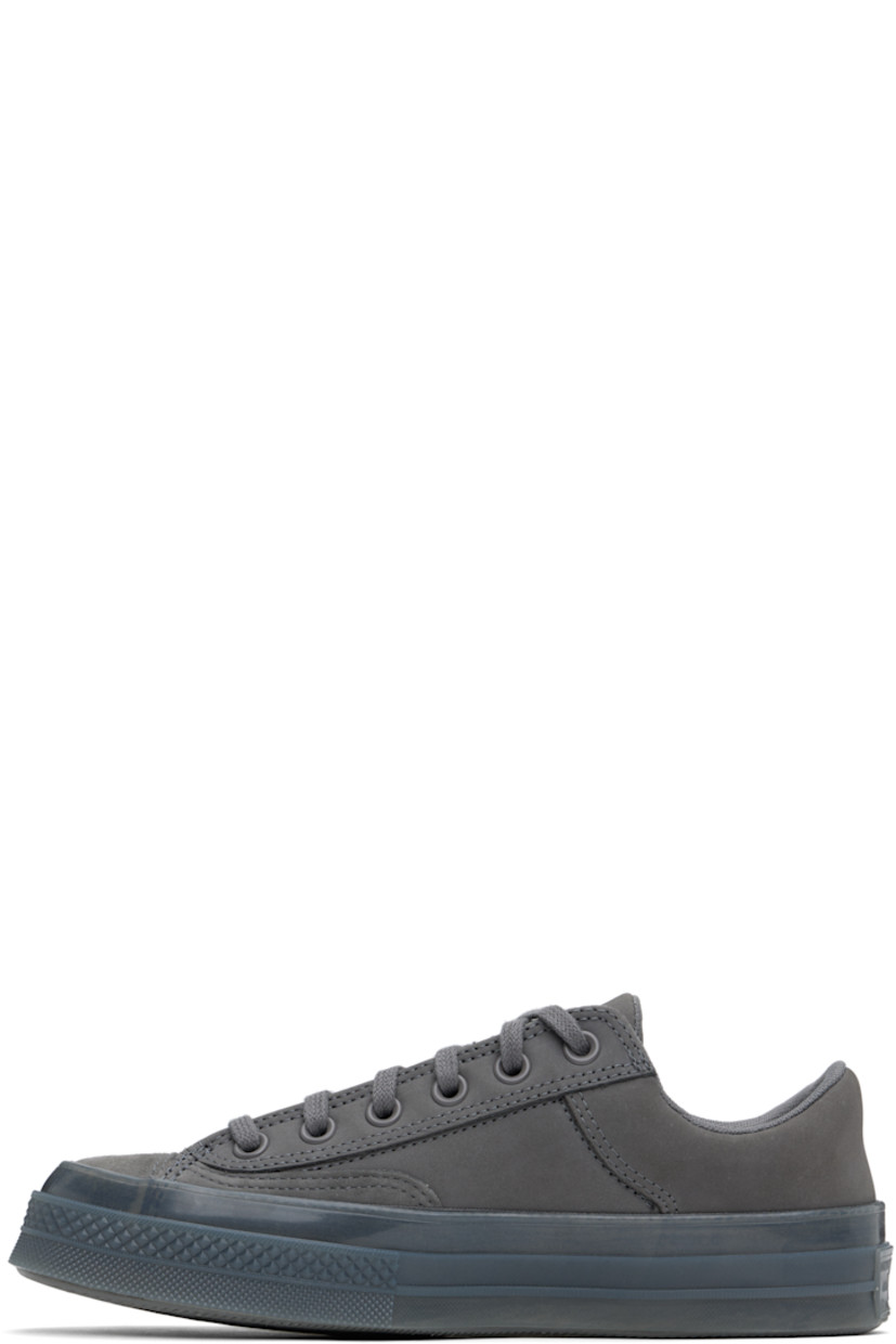 Low-top paneled suede and nubuck sneakers in gray.

· Lace-up closure
· Logo patch at padded tongue
· Padded collar
· Logo embossed at outer side
· Rubberized logo patch at heel
· Padded CX foam footbed
· Mesh lining
· Semi-transparent rubber midsole
· Treaded rubber sole

Supplier color: Sharkskin/Sharkskin/Sharkskin
