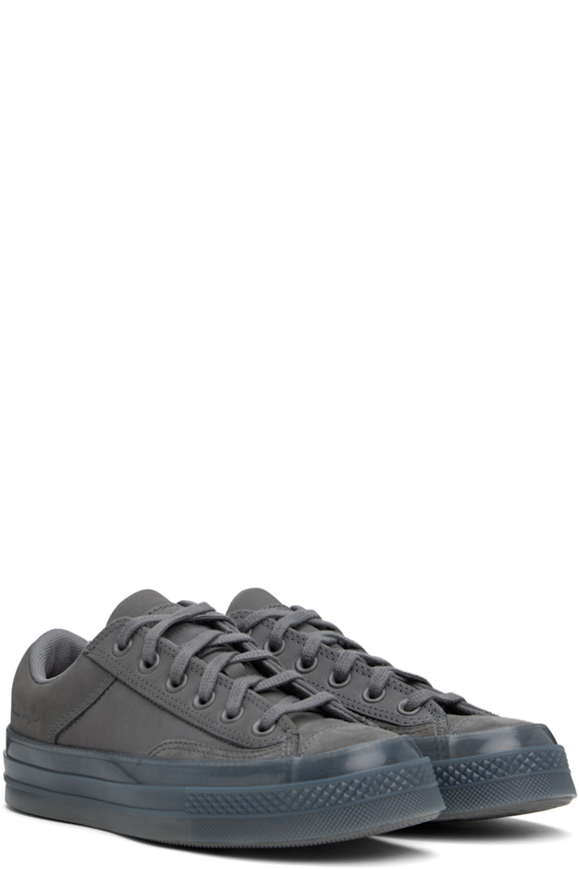 Low-top paneled suede and nubuck sneakers in gray.

· Lace-up closure
· Logo patch at padded tongue
· Padded collar
· Logo embossed at outer side
· Rubberized logo patch at heel
· Padded CX foam footbed
· Mesh lining
· Semi-transparent rubber midsole
· Treaded rubber sole

Supplier color: Sharkskin/Sharkskin/Sharkskin