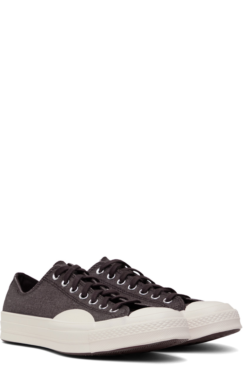 Low-top canvas sneakers in burgundy.

· Textured rubber cap toe
· Lace-up closure
· Eyelets at inner side
· Rubberized logo patch at heel
· Cushioned OrthoLite® footbed
· Textured treaded rubber sole

Supplier color: Rugged brown/Rugged brown