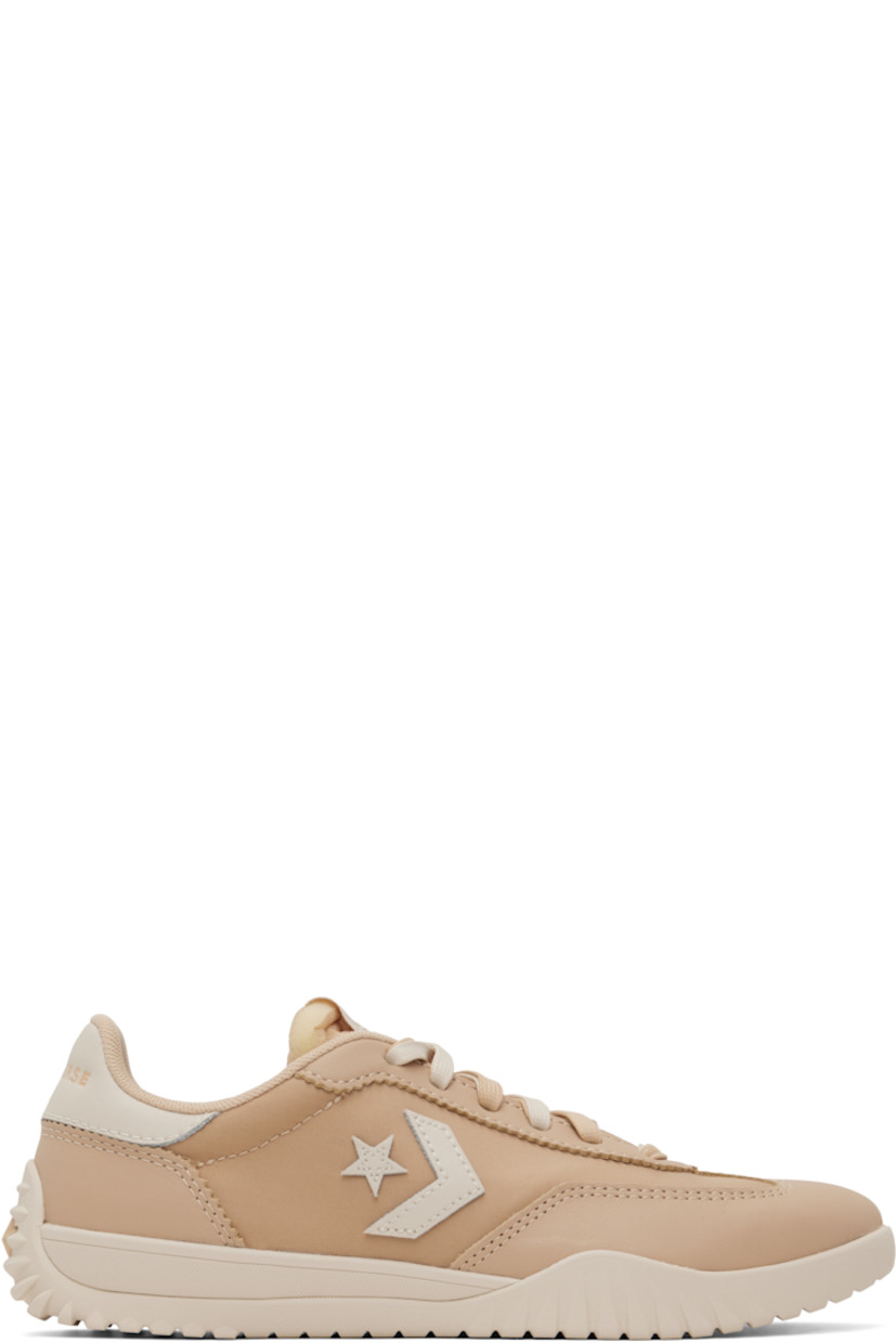 Low-top grained leather and canvas sneakers in tan. 

· Lace-up closure
· Logo flag at padded tongue
· Padded collar
· Logo appliqué at sides
· Logo embossed at heel tab
· Rubberized logo appliqué at heel
· Cushioned CX foam footbed
· Mesh lining
· Treaded rubber sole

Supplier color: Coastal dune/Natural ivory