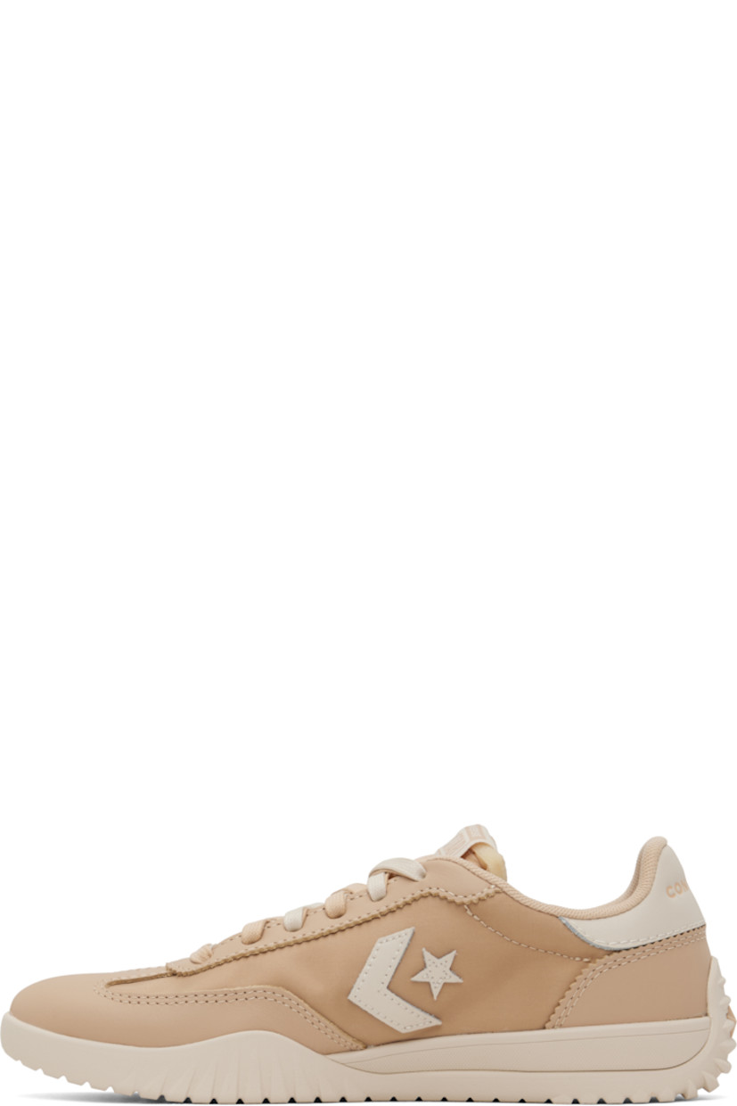Low-top grained leather and canvas sneakers in tan. 

· Lace-up closure
· Logo flag at padded tongue
· Padded collar
· Logo appliqué at sides
· Logo embossed at heel tab
· Rubberized logo appliqué at heel
· Cushioned CX foam footbed
· Mesh lining
· Treaded rubber sole

Supplier color: Coastal dune/Natural ivory