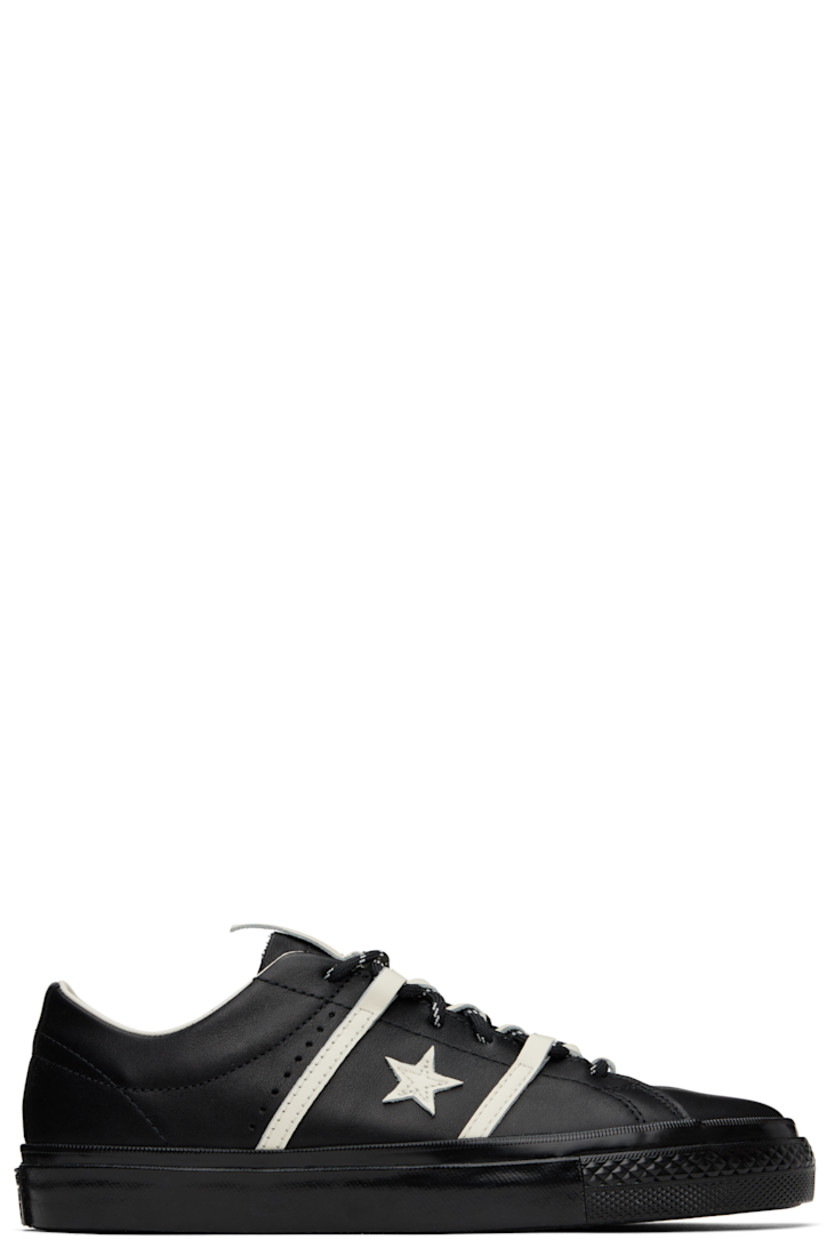 Low-top buffed leather sneakers in black.

· Lace-up closure
· Pull-tab at tongue
· Concealed elasticized gusset at tongue
· Padded collar
· Logo and stripe appliqués at sides
· Perforated detailing at sides
· Cushioned CX foam insole
· Canvas and mesh lining
· Rubberized logo patch at heel
· Treaded rubber sole
· Includes alternate laces in black

Part of the Converse x Bobby Dekeyzer collaboration.

Supplier color: Black/Egret/Black