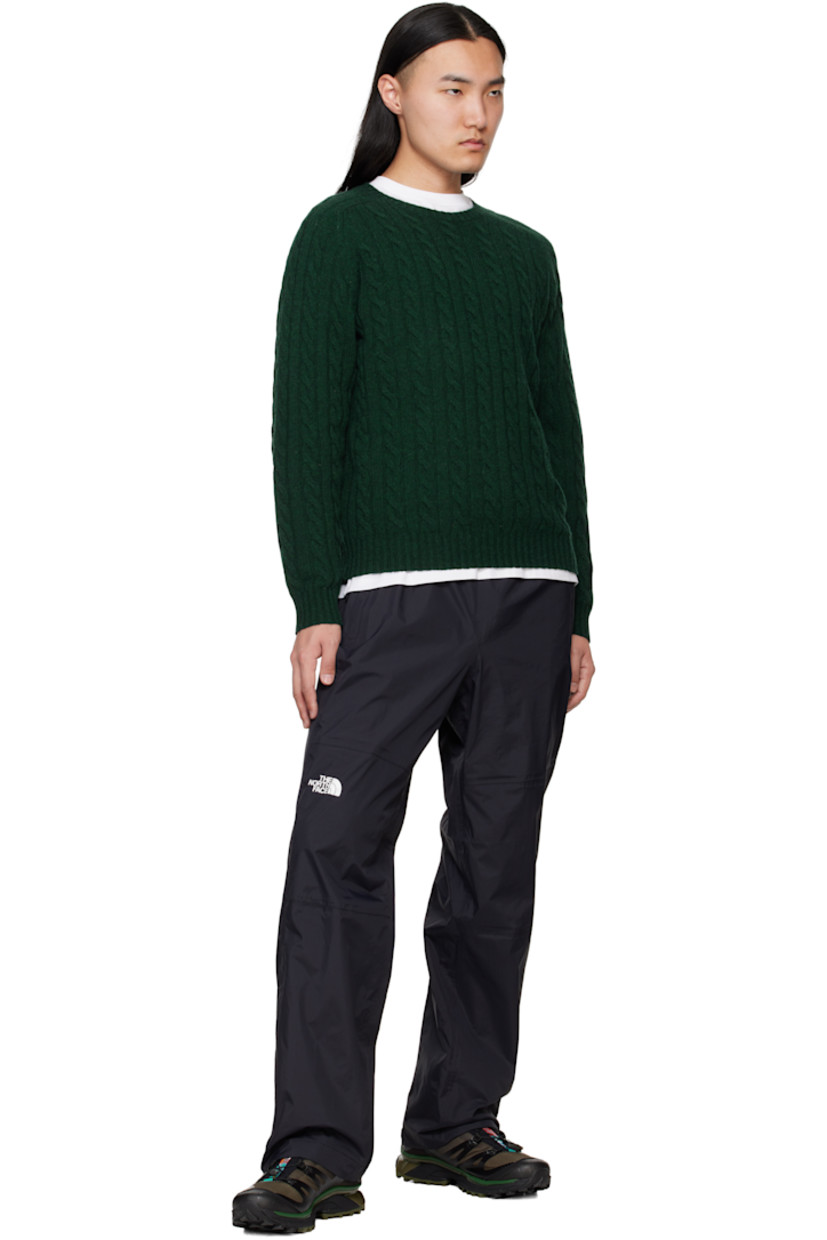 Loose-fit DryVent™ nylon ripstop trousers. Wind-resistant and non-PFC DWR-coated waterproof.

· Concealed drawstring at elasticized waistband
· Two-pocket styling
· Text bonded at waist
· Logo bonded at leg
· Zip vent and velcro tab at cuffs
· Partial mesh lining

Supplier color: TNF black
