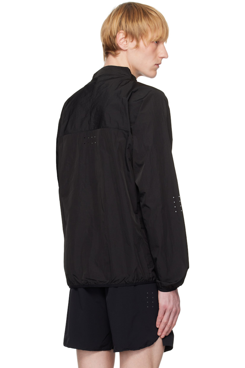Water-repellent nylon taffeta jacket.

· Stand collar
· Zip closure
· Reflective logo printed at chest 
· Elasticized trim at hem and cuffs
· Mesh patch pocket at side seam
· Zip seam pocket 
· Raglan sleeves
· Reflective graphic printed at sleeves
· Perforated detailing at back
· Unlined

Supplier color: 3M black rain