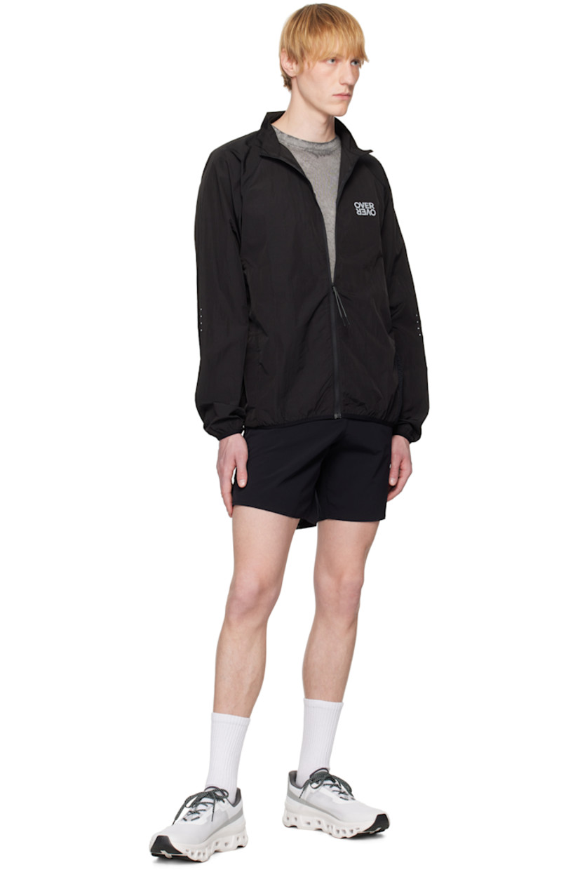 Water-repellent nylon taffeta jacket.

· Stand collar
· Zip closure
· Reflective logo printed at chest 
· Elasticized trim at hem and cuffs
· Mesh patch pocket at side seam
· Zip seam pocket 
· Raglan sleeves
· Reflective graphic printed at sleeves
· Perforated detailing at back
· Unlined

Supplier color: 3M black rain