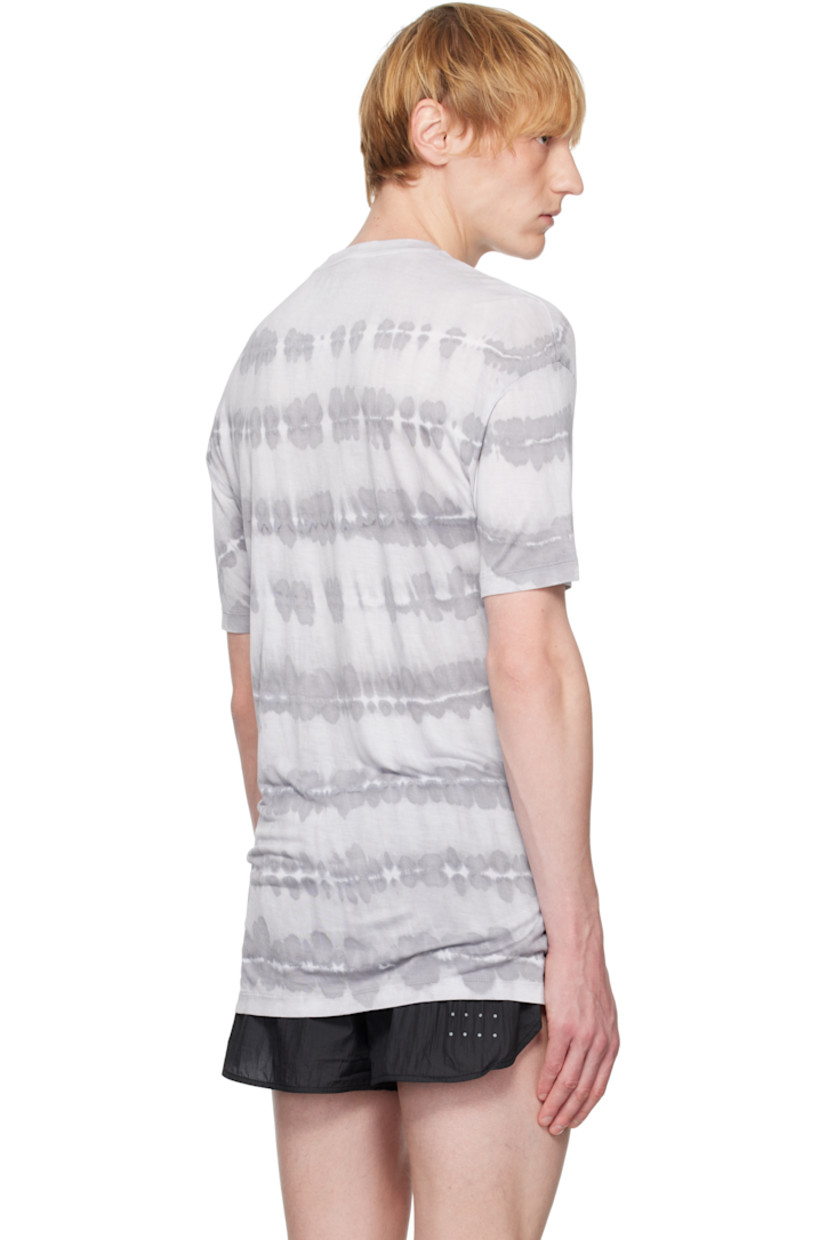 Collagenic cotton jersey tank top. Tie-dye pattern throughout. 

· Anti-odor and antibacterial
· UV 50+ protection
· Rib-knit crewneck
· Reflective logo printed at chest
· Dropped shoulders

Each item is unique. Please note coloration may vary.

Supplier color: Windows dye