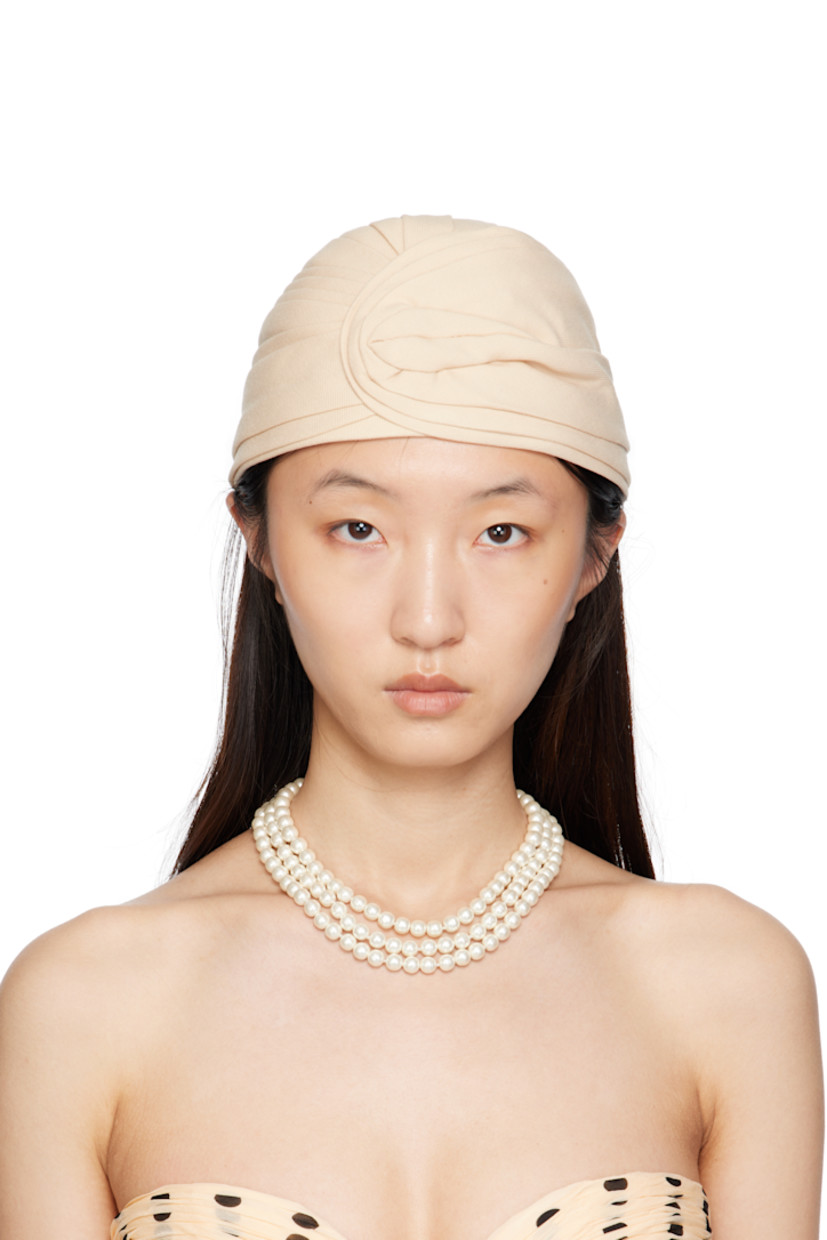 Structured virgin wool canvas hat.

· Logo hardware at back face
· Grosgrain browband
· Satin lining

Supplier color: Latte/Gold