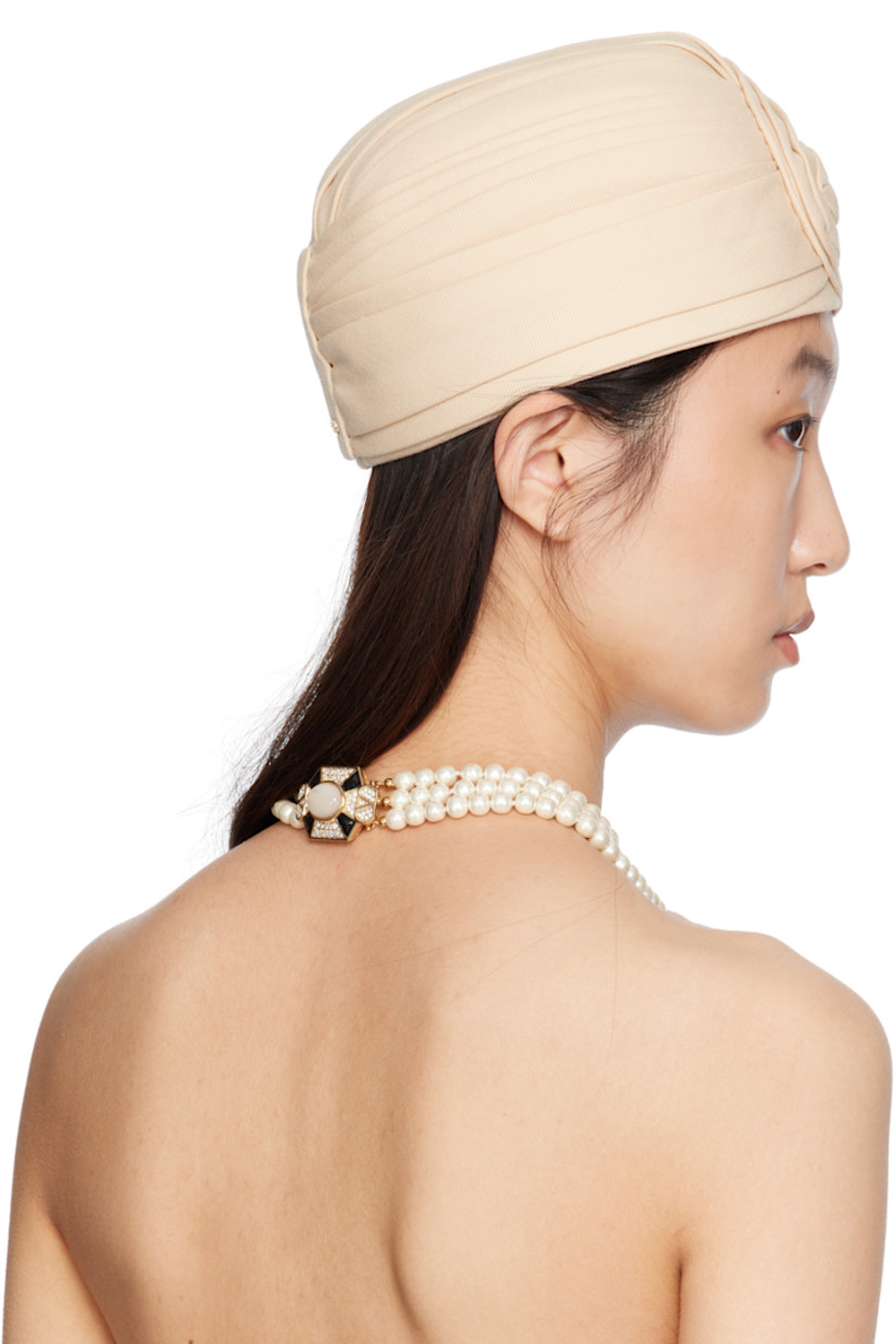 Structured virgin wool canvas hat.

· Logo hardware at back face
· Grosgrain browband
· Satin lining

Supplier color: Latte/Gold