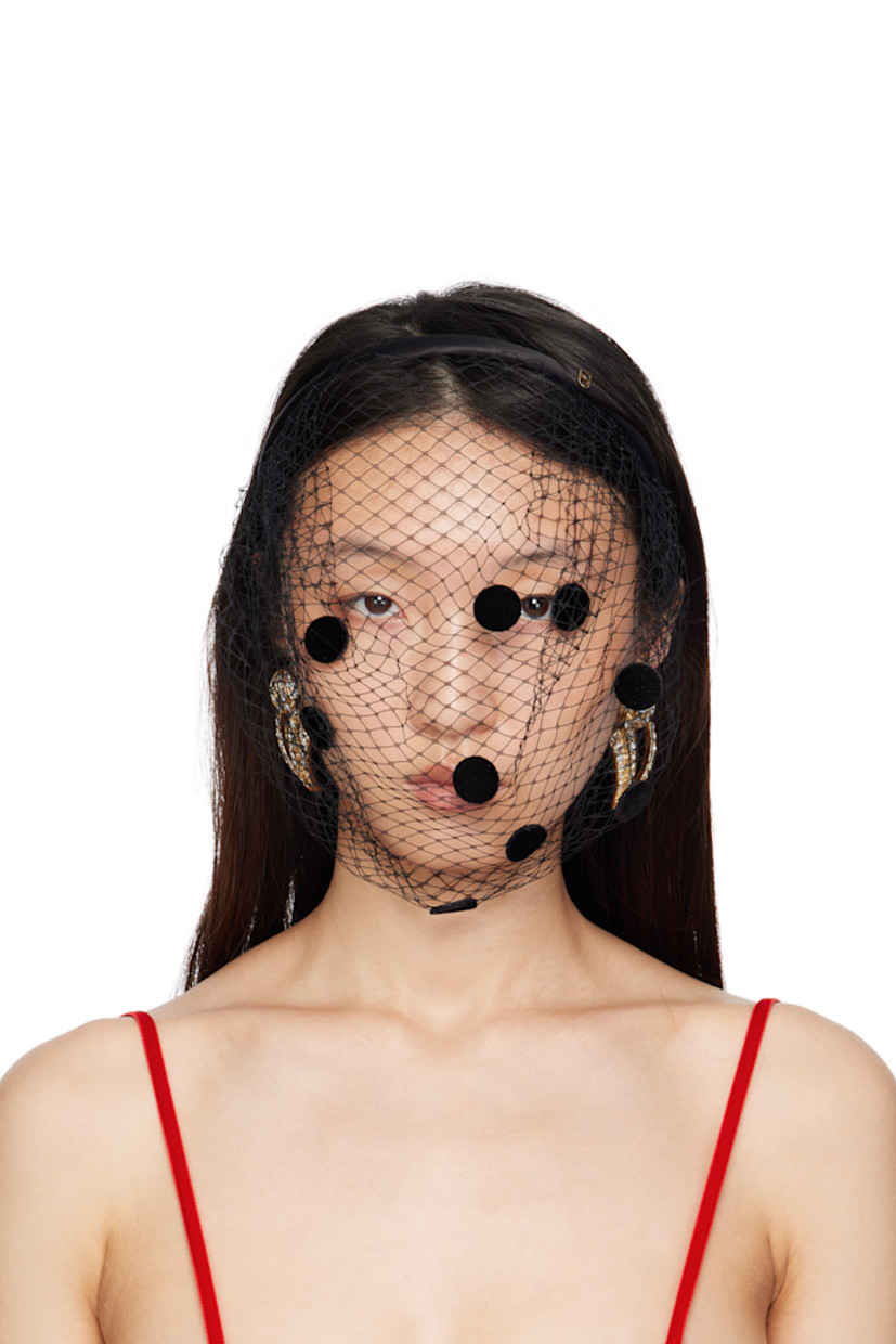 Satin headband. 

· Logo hardware at top
· Fishnet veil with polka-dot appliqués at face
· Gold-tone hardware
· H10.5"

Supplier color: Nero/Nero