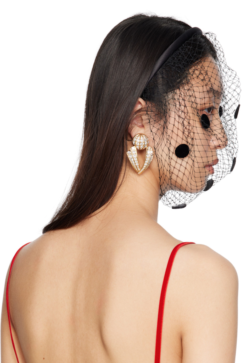 Satin headband. 

· Logo hardware at top
· Fishnet veil with polka-dot appliqués at face
· Gold-tone hardware
· H10.5"

Supplier color: Nero/Nero