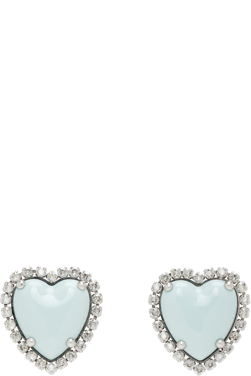 Pair of stud earrings in antiqued silver tone.

· Resin graphic and prong-set Swarovski crystals at face
· Clip-on fastening
· H1.75" x W1.5"

Supplier color: Palladium/Azure