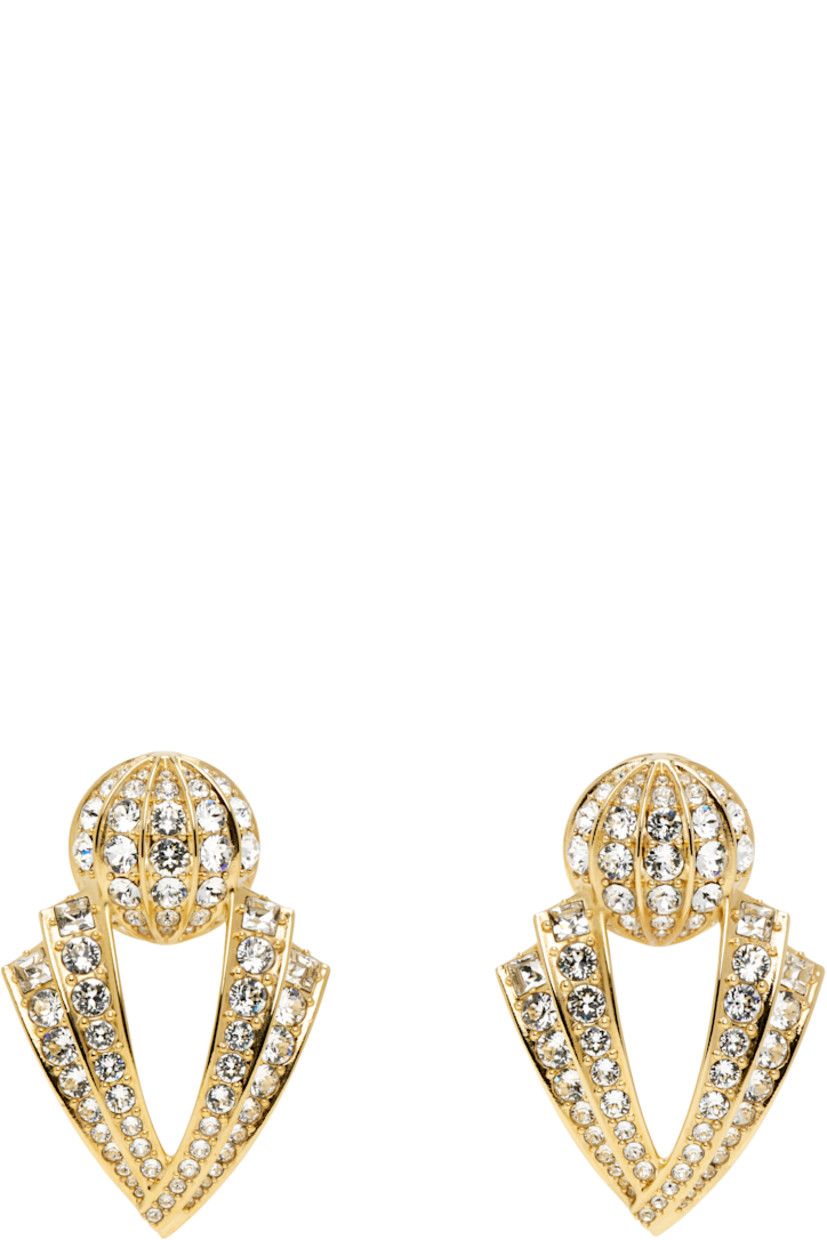 Pair of drop earrings in gold tone.

· Pavé-set crystals throughout
· Clip-on fastening
· H2.25" x W1.5"

Supplier color: Oro/Crystal