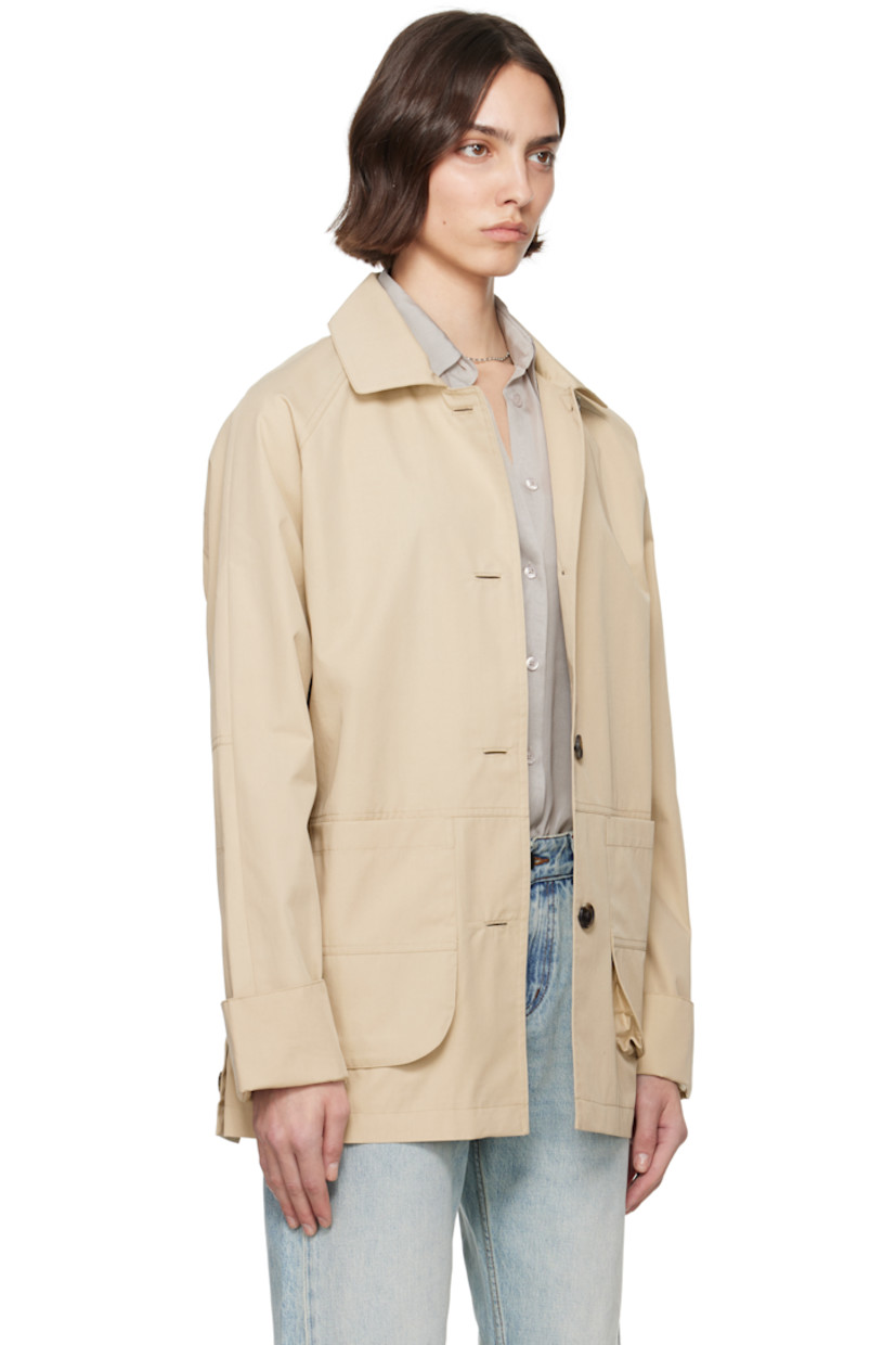 Oversized cotton- and nylon-blend gabardine jacket.

· Spread collar
· Button closure
· Patch pockets
· Button vent at side seams
· Raglan sleeves
· Storm flap at back
· Full bemberg satin lining

Supplier color: Oyster compact cotton