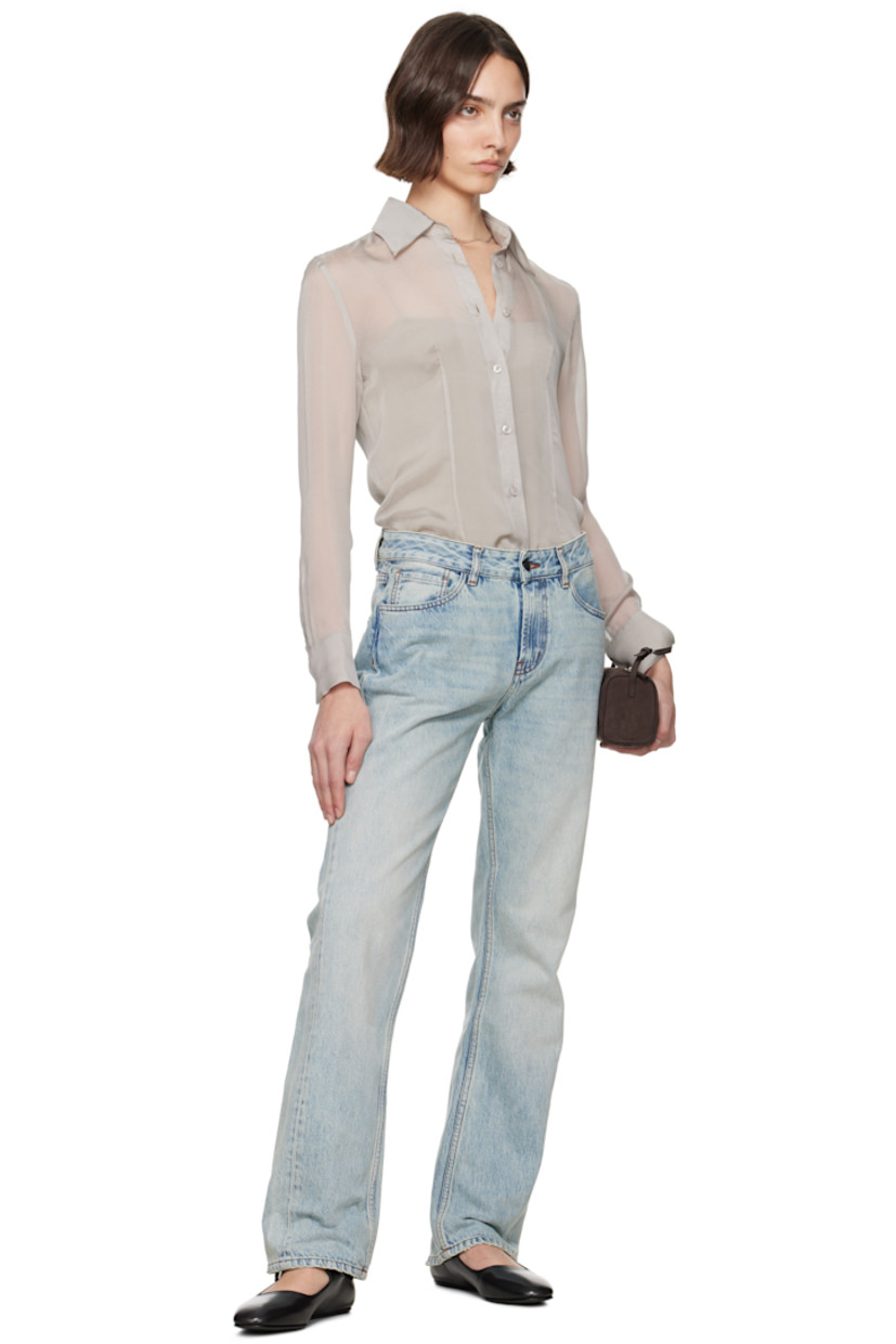 Straight-leg non-stretch denim jeans. Fading and whiskering throughout.

· Low-rise
· Belt loops
· Five-pocket styling
· Zip fly
· Logo patch at back waistband
· Contrast stitching in tan

Supplier color: Acide fadeout