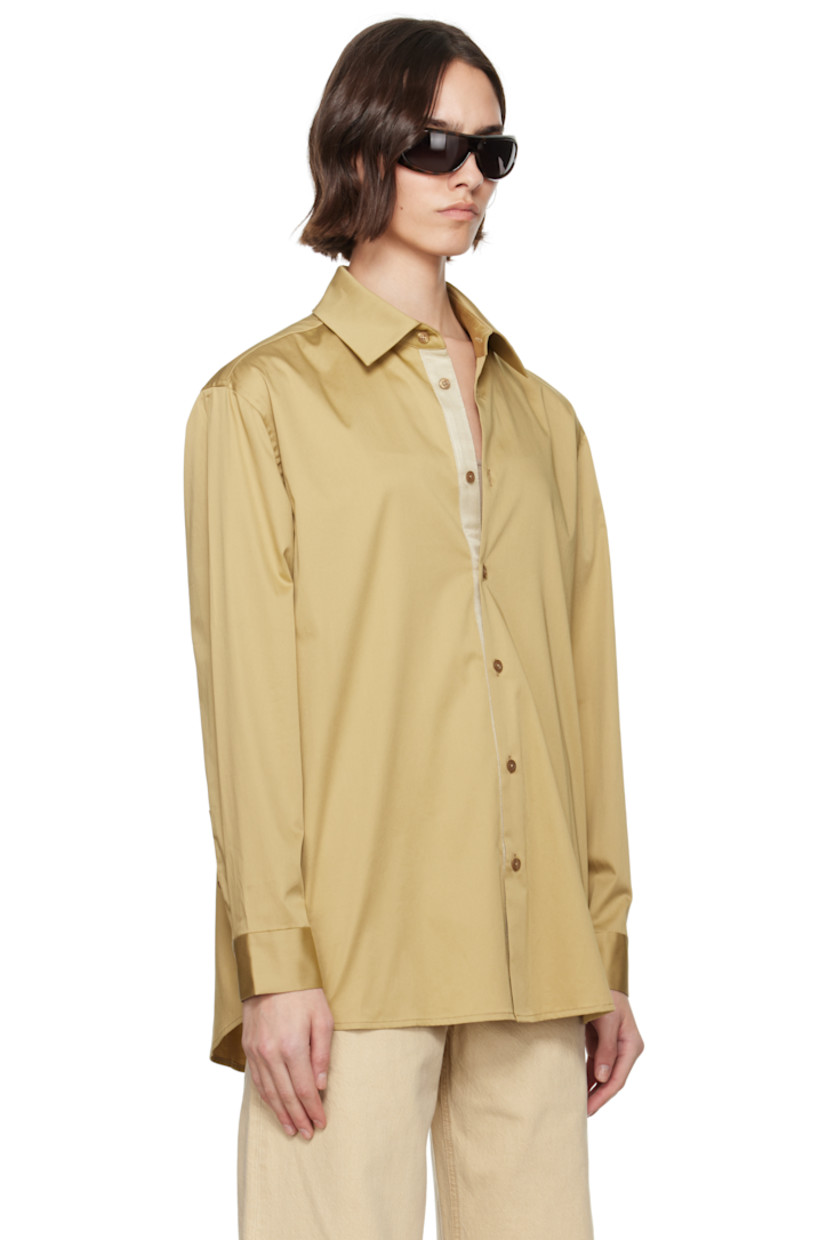 Wrinkle-resistant stretch cotton sateen shirt.

· Spread collar
· Button closure
· Shirttail hem
· Dropped shoulders
· Buttoned barrel cuffs
· Box pleat at back yoke

Supplier color: Khaki