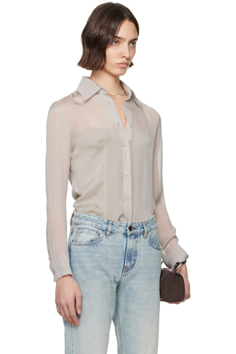 Sheer silk chiffon shirt.

· Spread collar
· Button closure
· Darts at front and back
· Shirttail hem
· Buttoned barrel cuffs

Supplier color: Pearl silk chiffon